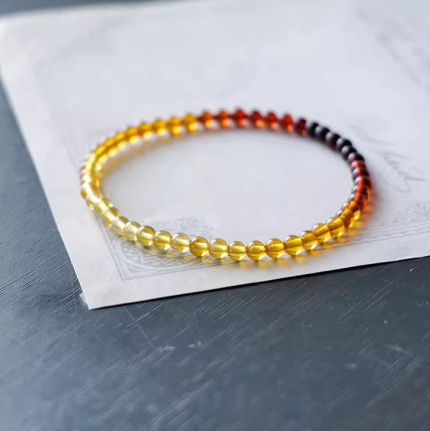 Amber beaded bracelet -gradual changing of colors